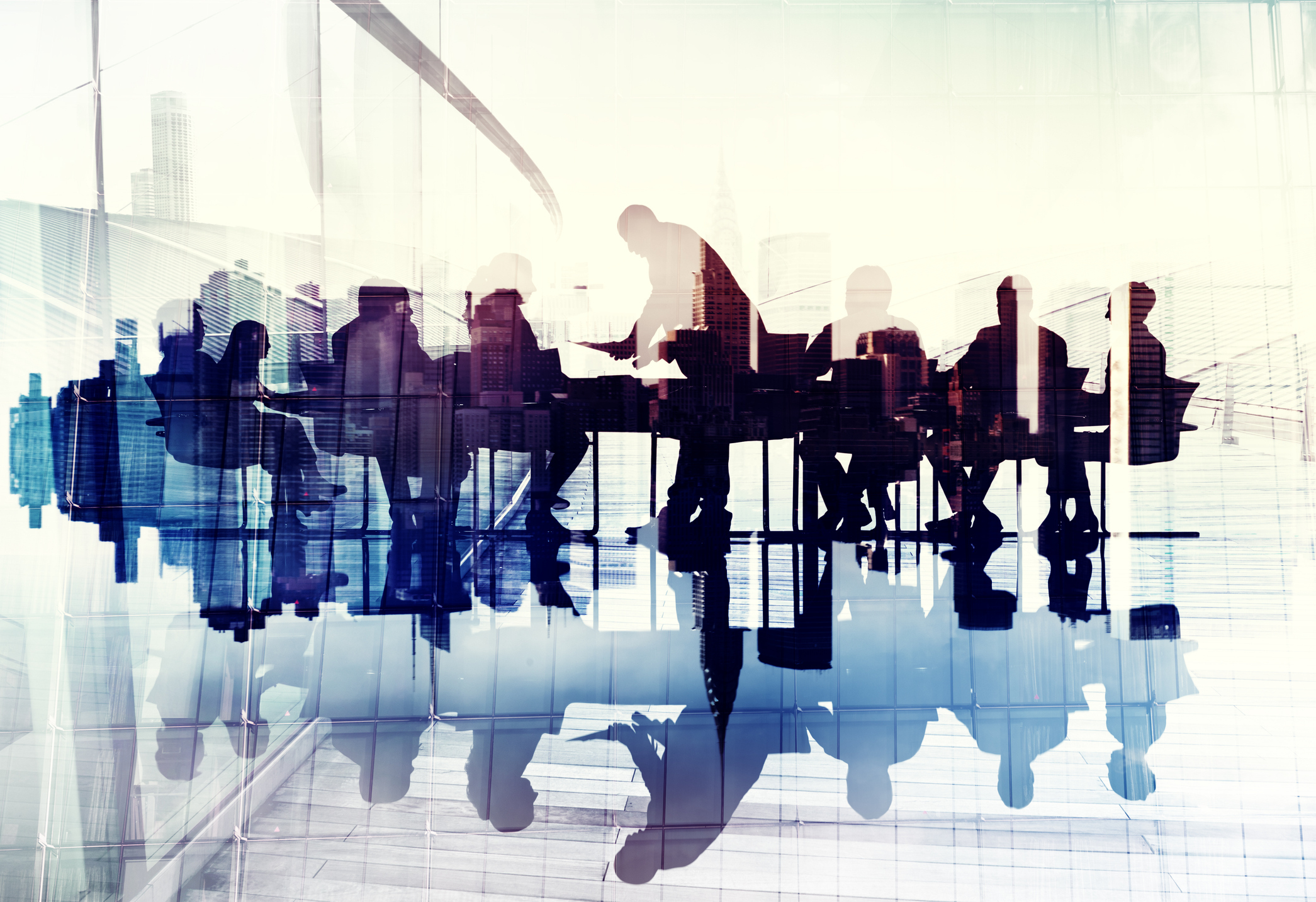 Abstract Image of Business People's Silhouettes in a Meeting